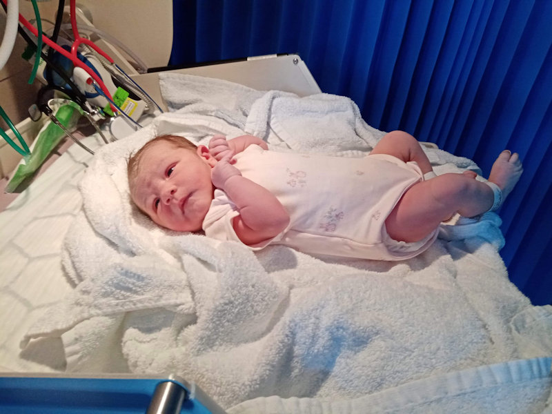 A new-born baby girl