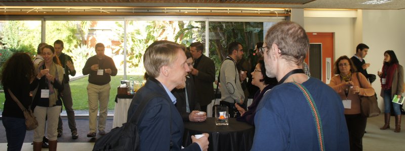 Lots of people networking at a conference